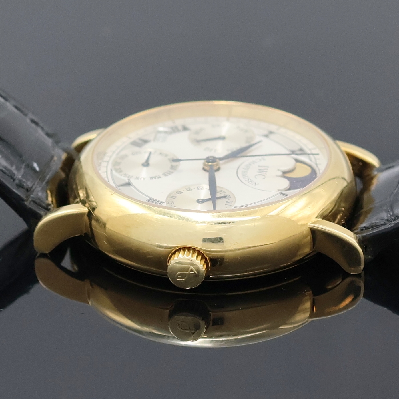 Detail d: IWC Portofino Armbanduhr mit ewigem Kalender in GG 750/000 Referenz 3541, Schweiz um 1990, Automatik, 2-tlg. Geh., Boden verschr., orig. Krone sowie ...