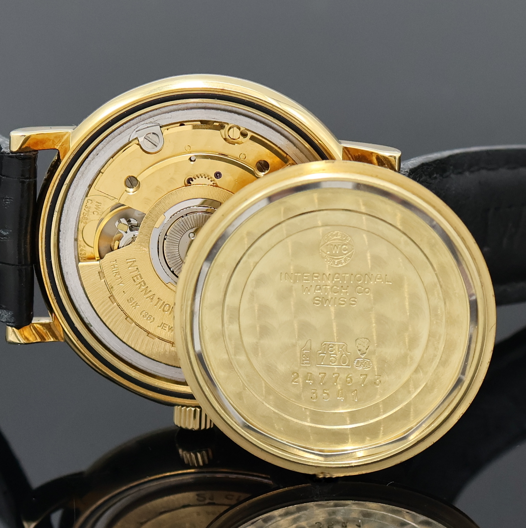 Detail h: IWC Portofino Armbanduhr mit ewigem Kalender in GG 750/000 Referenz 3541, Schweiz um 1990, Automatik, 2-tlg. Geh., Boden verschr., orig. Krone sowie ...