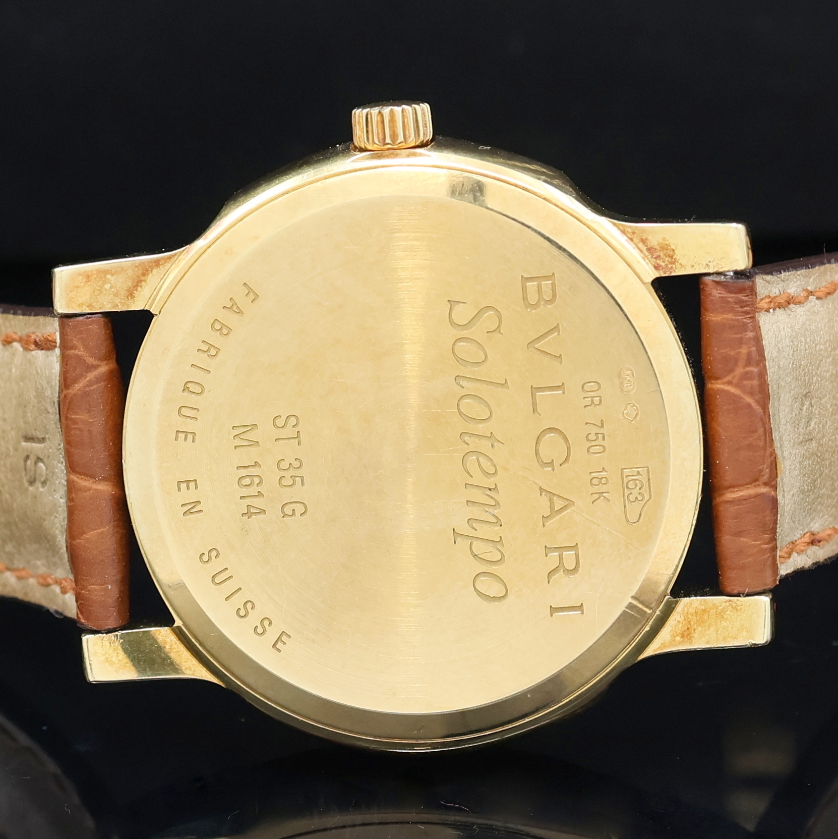Detail e: BULGARI Solotempo Armbanduhr in GG 750/000 Referenz ST35G, Schweiz um 2010, quarz, 2- tlg. Geh., Boden dell. aufgedr., orig. Lederband m. Stiftschl. ...