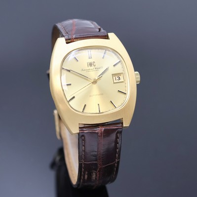 27022920b - IWC schwere Herrenarmbanduhr in GG 750/000, Schweiz um 1970, Automatik, 2-tlg. Geh., ...