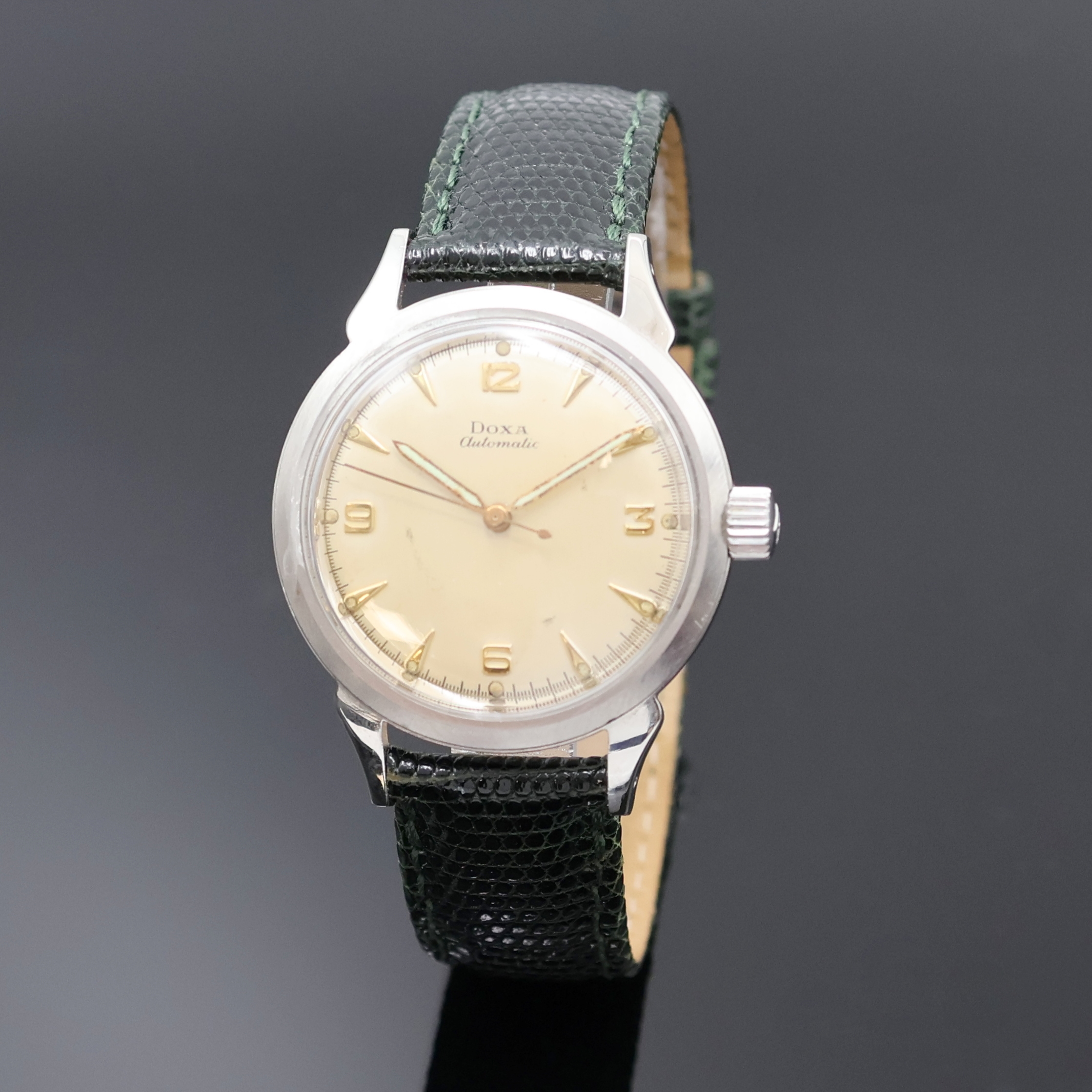 Image 27023203 - DOXA Herrenarmbanduhr in Stahl, Schweiz um 1960, Automatik, Boden verschr., silb. ...