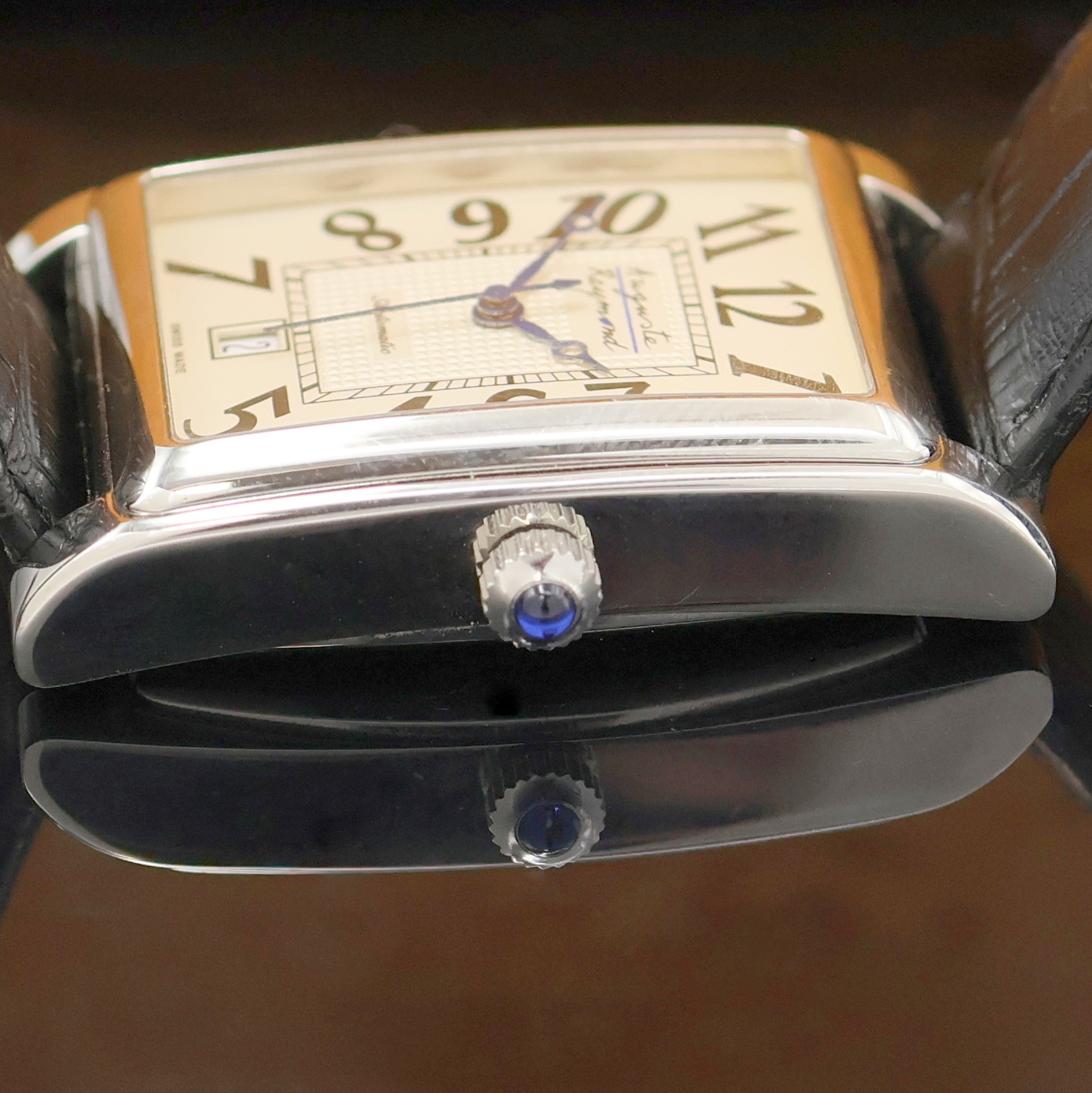 Detail c: AUGUSTE RAYMOND rechteckige Herrenarmbanduhr in Stahl, Schweiz um 2010, Automatik, beids. vergl., Boden gedr., Saphirgl., Schmuckkrone, silb. ...