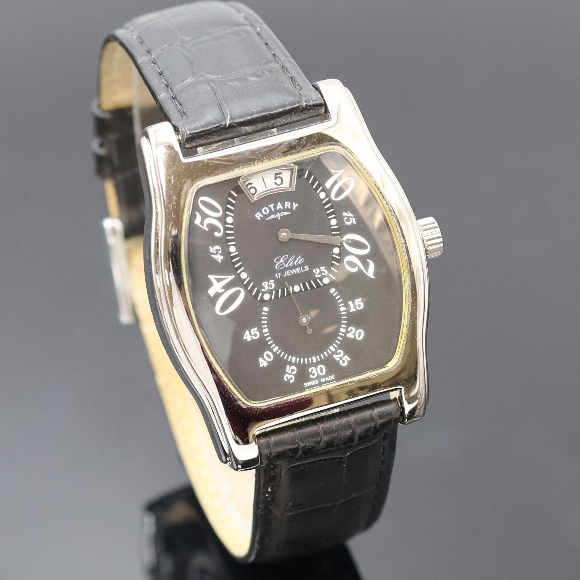 Detail b: ROTARY Elite Armbanduhr mit springender Stunde in Stahl Referenz 10689, Schweiz um 1995, Handaufzug, beids. vergl. Geh., Boden aufgedr., orig. ...
