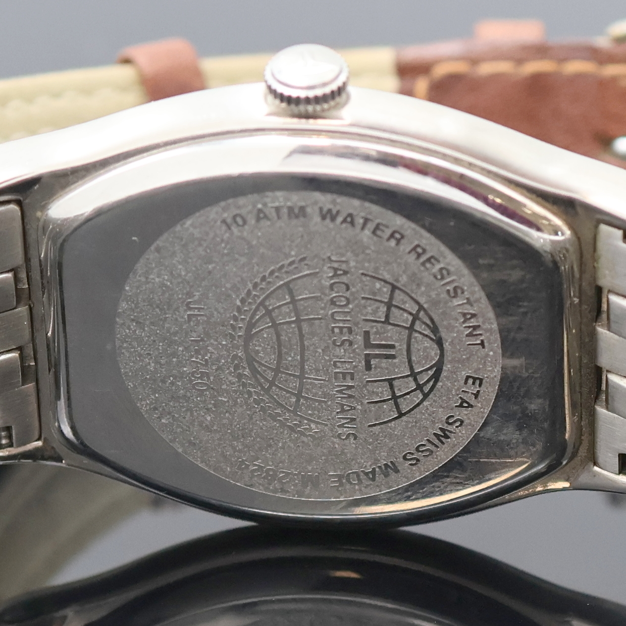 Detail f: JACQUES LEMANS 2 Armbanduhren in Stahl, Schweiz um 2000, Automatik, 1x beids. vergl., Böden verschr. u. aufgedr., 1x orig. Gliederband m. Faltschl., ...
