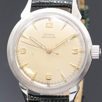 27023203a - DOXA Herrenarmbanduhr in Stahl, Schweiz um 1960, Automatik, Boden verschr., silb. ...