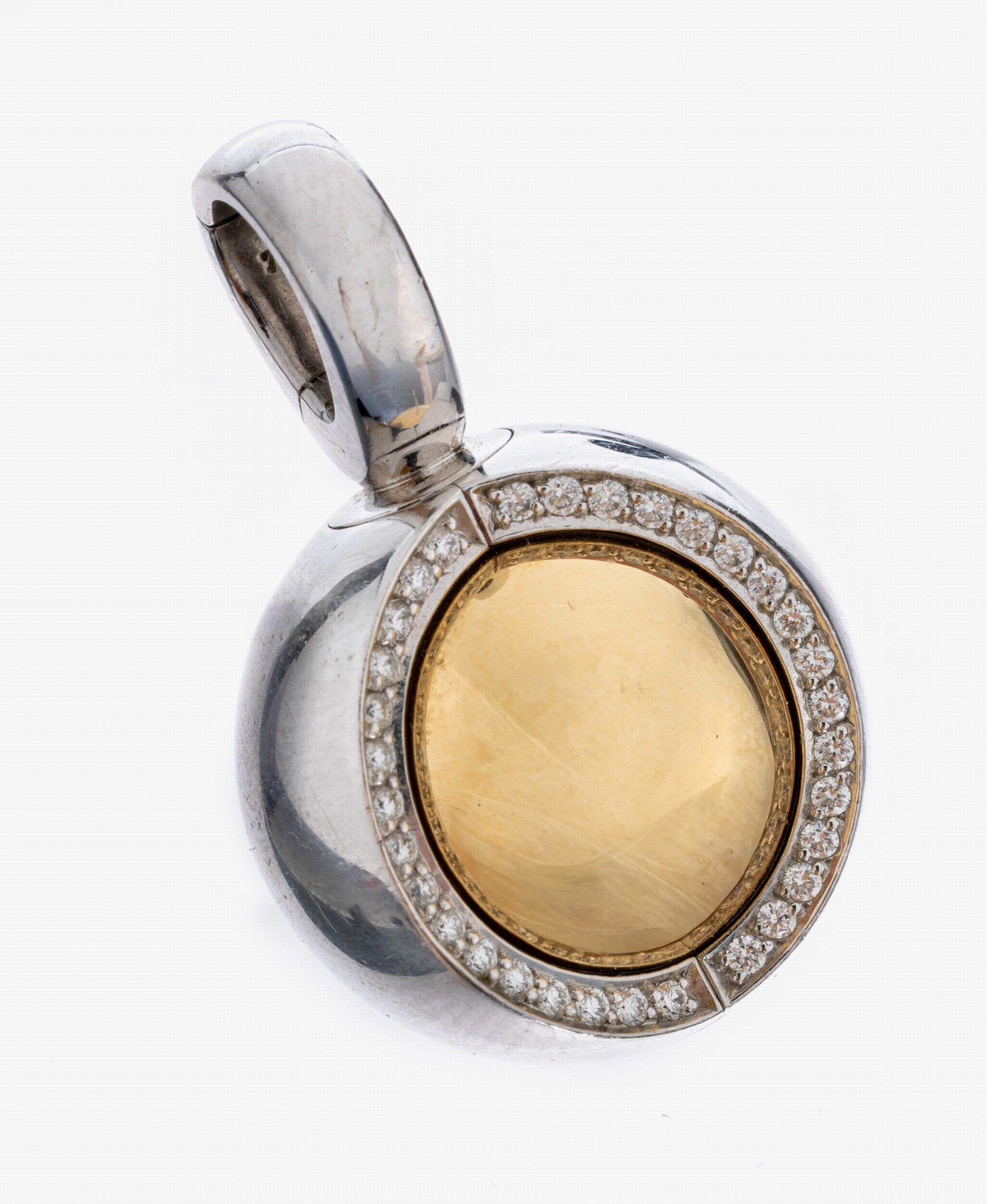 Detail b: 18 kt Gold JÖRG HEINZ Brillant-"Magic Pendant", WG/GG 750/000, pol., Innenkugel drehbar, 1 x WG pol. mit Brillant ca. 0.15 ct feines ...