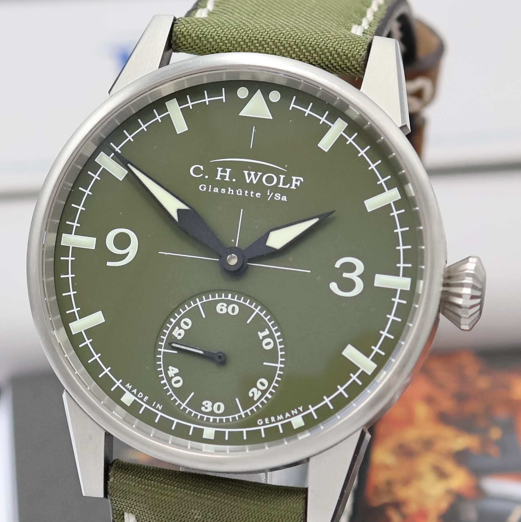Detail a: C.H. WOLF Pilot Green Herrenarmbanduhr in Stahl, Deutschland verk. lt. beil. Garantie 07/2015, Handaufzug, beids. vergl. Geh., orig. Band m. ...