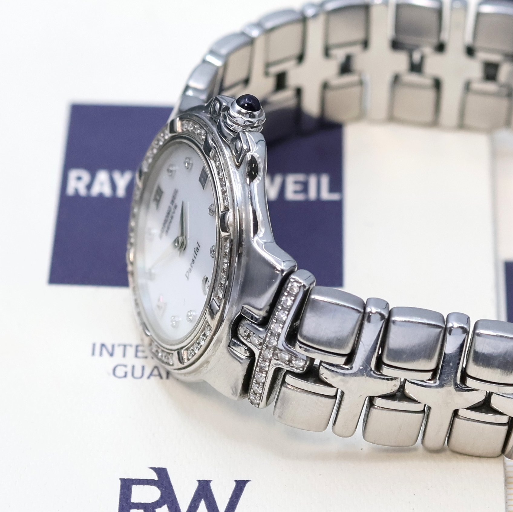 Detail c: RAYMOND WEIL Geneve Parsifal Armbanduhr Referenz 9995, Schweiz verk. lt. beil. Pap. 09/1998, quarz, Edelstahlgeh. inkl. Gliederband m. dopp. ...