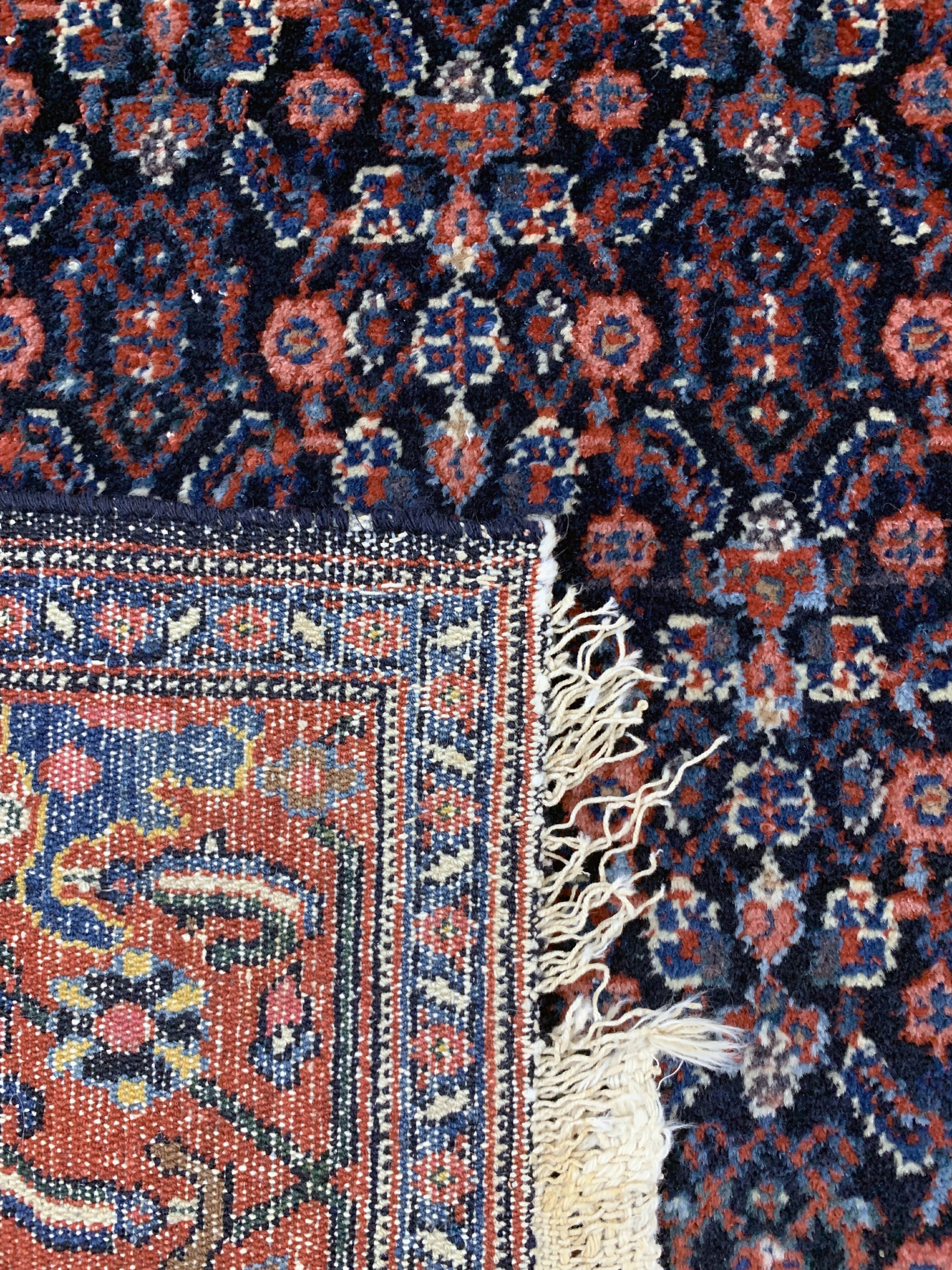 Detail f: Senneh antik, Persien, um 1900, Wolle auf Baumwolle, ca. 206 x 132 cm, EHZ: 2, (leicht beschädigt)