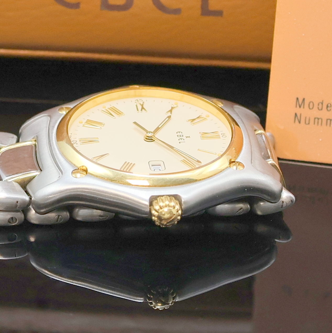 Detail c: EBEL Armbanduhr Serie 1911 Referenz 187902, quarz, Edelstahlgeh. inkl. Gliederband m. Faltschl., 18k Goldlünette gegen Geh. 5-fach verschr., 8-fach ...