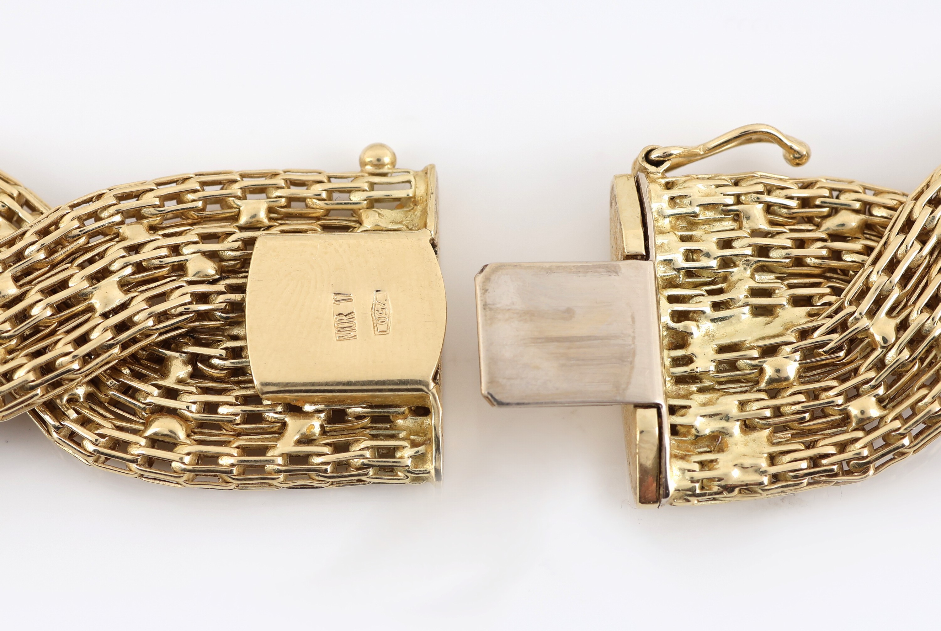 Detail b: 18 kt Gold Collier, GG 750/000, aufwändige Arbeit, 2 3-rhg. Stränge, B. ca. 1.8 cm, L. ca. 44.5 cm, ca. 75.2 g