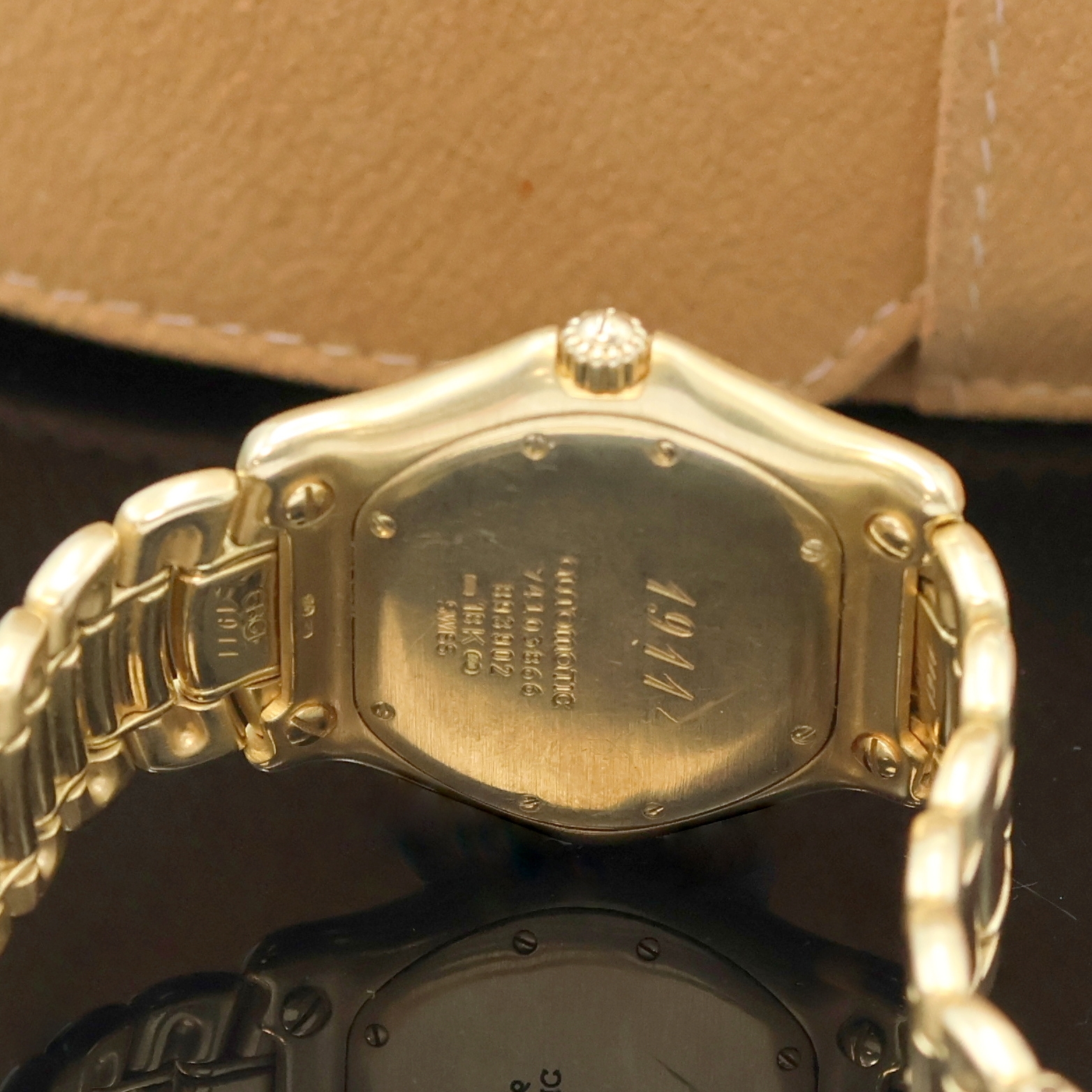 Detail e: EBEL 1911 Armbanduhr in GG 750/000 Referenz 893902, Schweiz verk. lt. beil. Garantiekarte 01/1998, Automatik, massives Geh. inkl. orig. Goldband m. ...