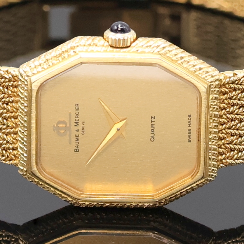 Detail a: BAUME & MERCIER Damenarmbanduhr in GG 750/000, Schweiz um 1970, quarz, Boden aufgedr., orig. Goldband, Schmuckkrone, gold. Zifferbl. m. gold. ...