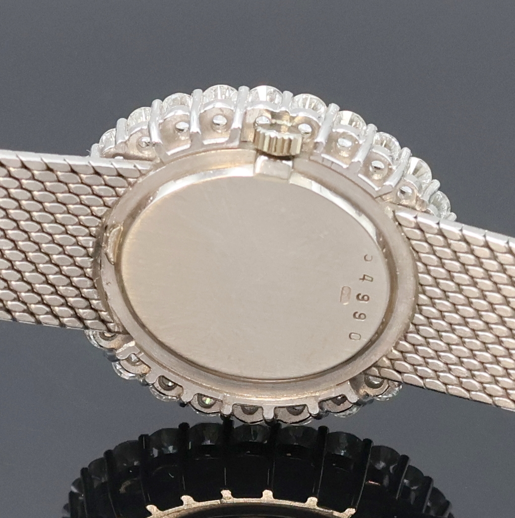 Detail d: AUDEMARS PIGUET Damenarmbanduhr in WG 750/000 mit Brillanten, Schweiz verk. lt. beil. Rechnung 09/1998, Handaufzug, Boden aufgedr., Goldband, ...