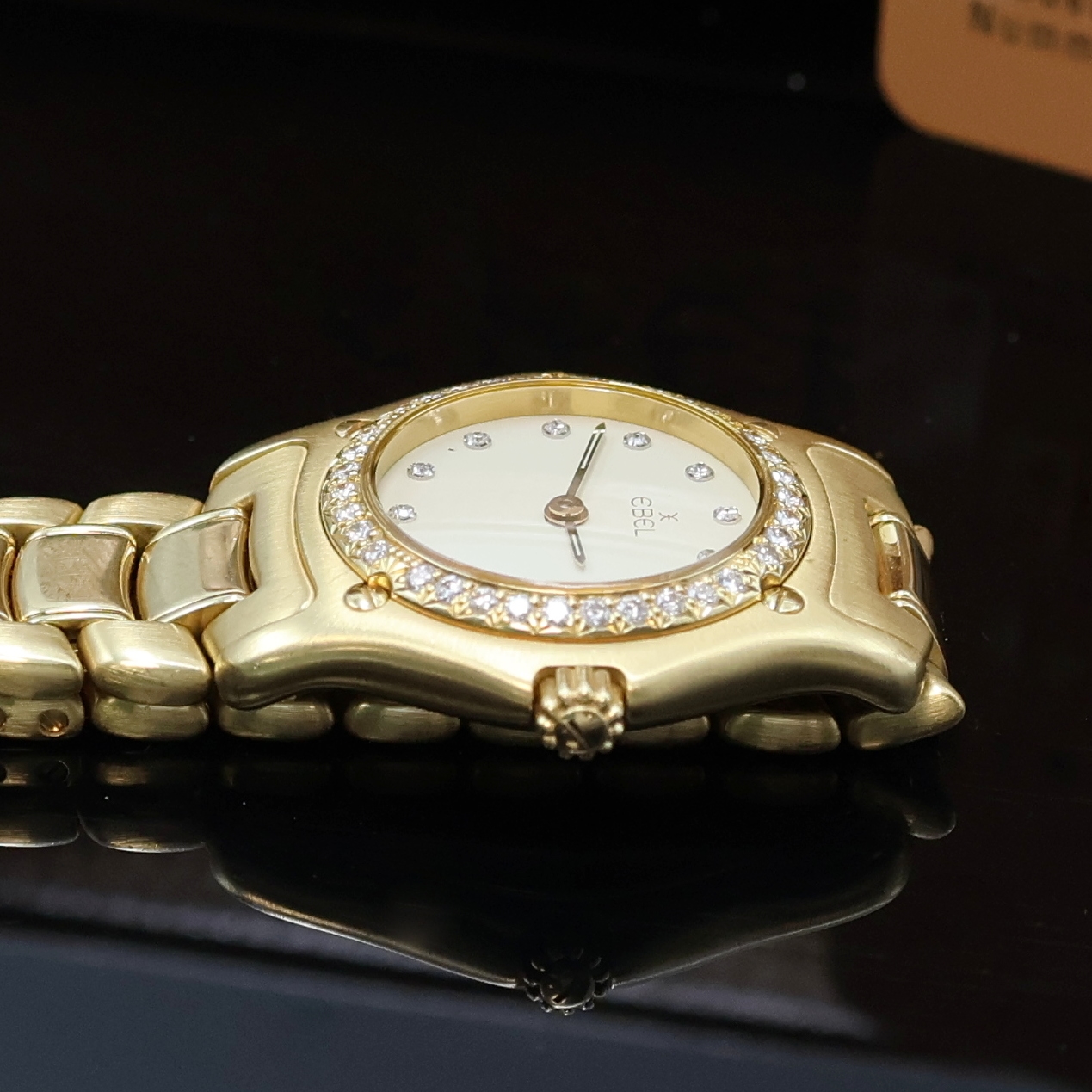 Detail d: EBEL 1911 Damenarmbanduhr in GG 750/000 Referenz 890910, Schweiz verk. lt. beil. Garantiekarte 01/1998, quarz, orig. Gliederband in GG 750/000 m. ...