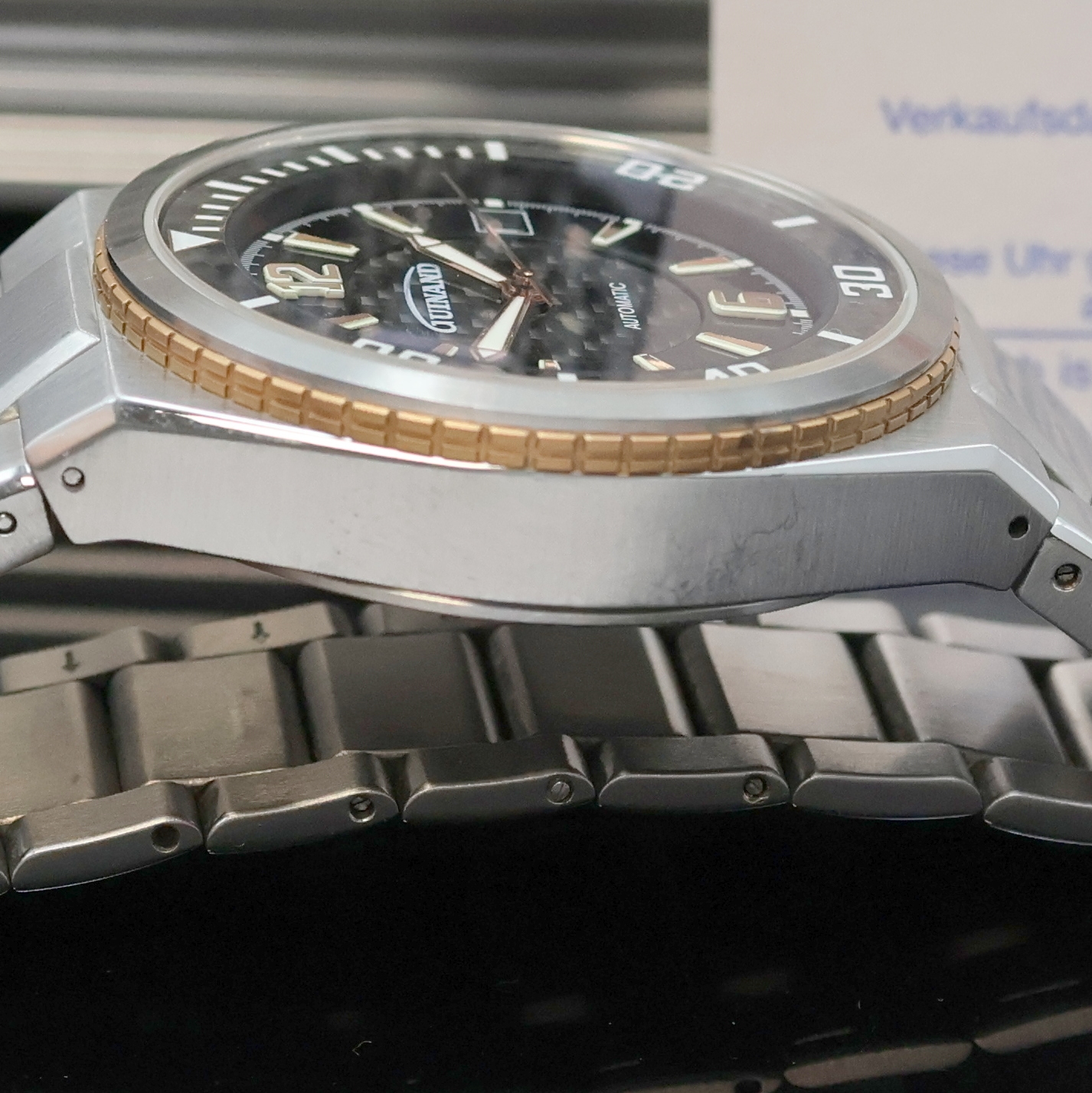Detail c: GUINAND Herrenarmbanduhr in Stahl Referenz G2401, Schweiz verk. lt. Garantie 09/2011, Automatik, Boden u. Krone verschr., integr. Stahlband m. dopp. ...