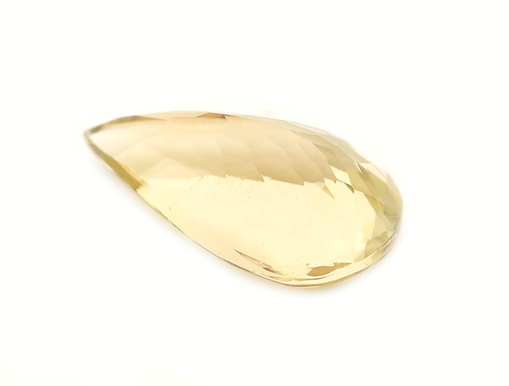 Detail a: Loser gelber Zoisit, ca. 2.78 ct, facett. Tropfen, 12.85 x 7.05 x 4.57 mm, Herkunft Tansania, keine Anzeichen für Erhitzung, Gemological ...