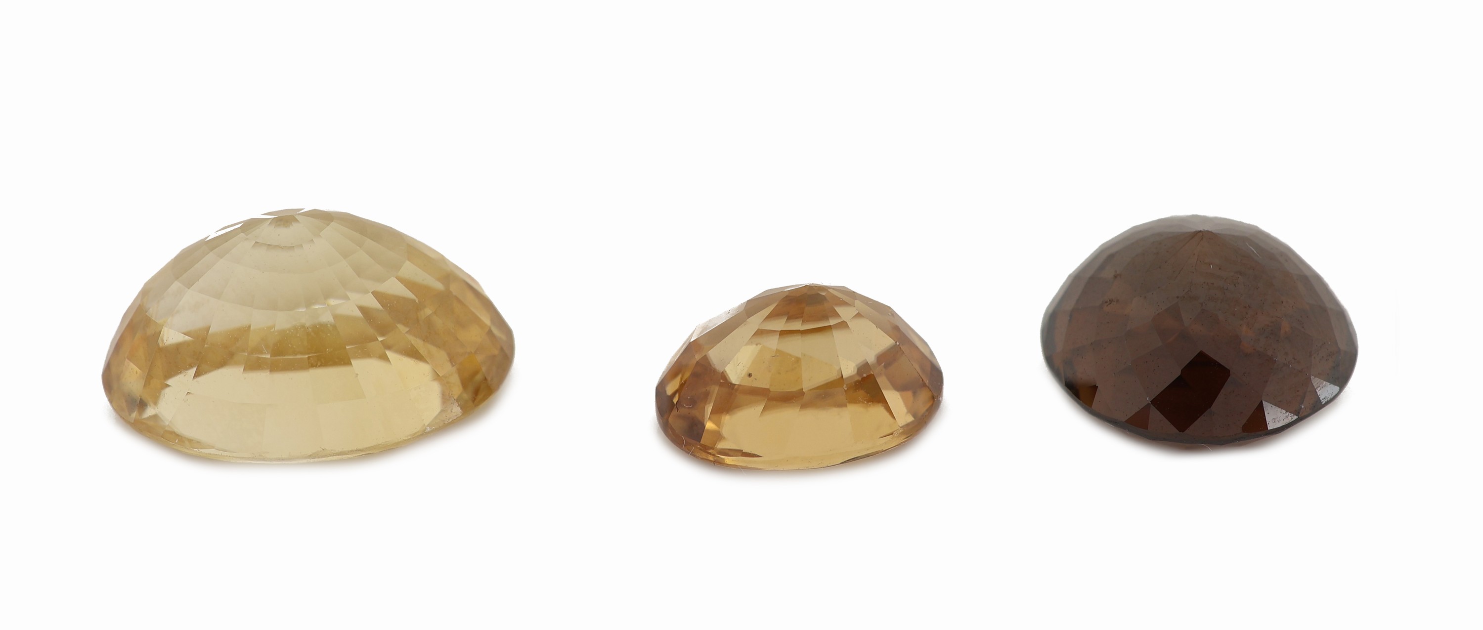 Detail a: Lot 3 lose Zirkone, zus. ca. 25.27 ct, versch.Schliffformen und Farben