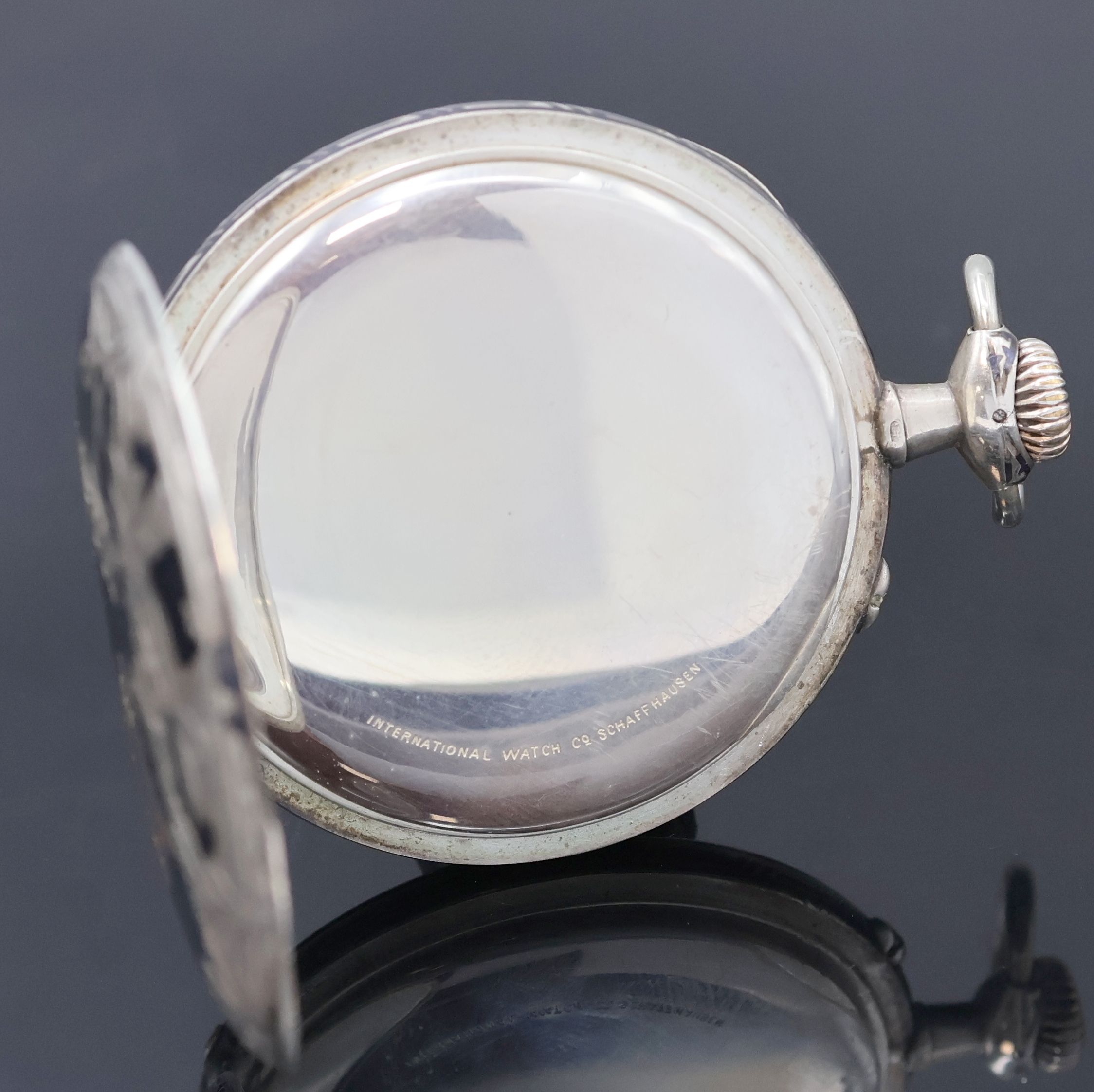 Detail b: IWC Herrentaschenuhr in Tula-Silber, Schweiz um 1909, offenes Geh. mit Tula-Einlage teilw. fehlend, Emailzifferbl. mit arab. Zahlen riss., gebl. ...