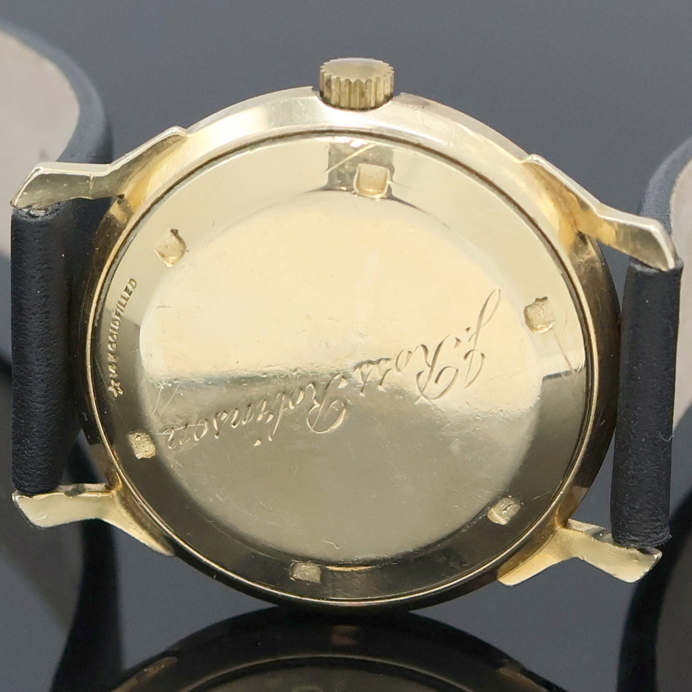 Detail d: UNIVERSAL Herrenarmbanduhr Kaliber 138SS in 14k Gold Filled, Schweiz/USA um 1950, Hammerautomatik, 2-tlg. Geh., verschr. Boden m. Namensgravur, ...