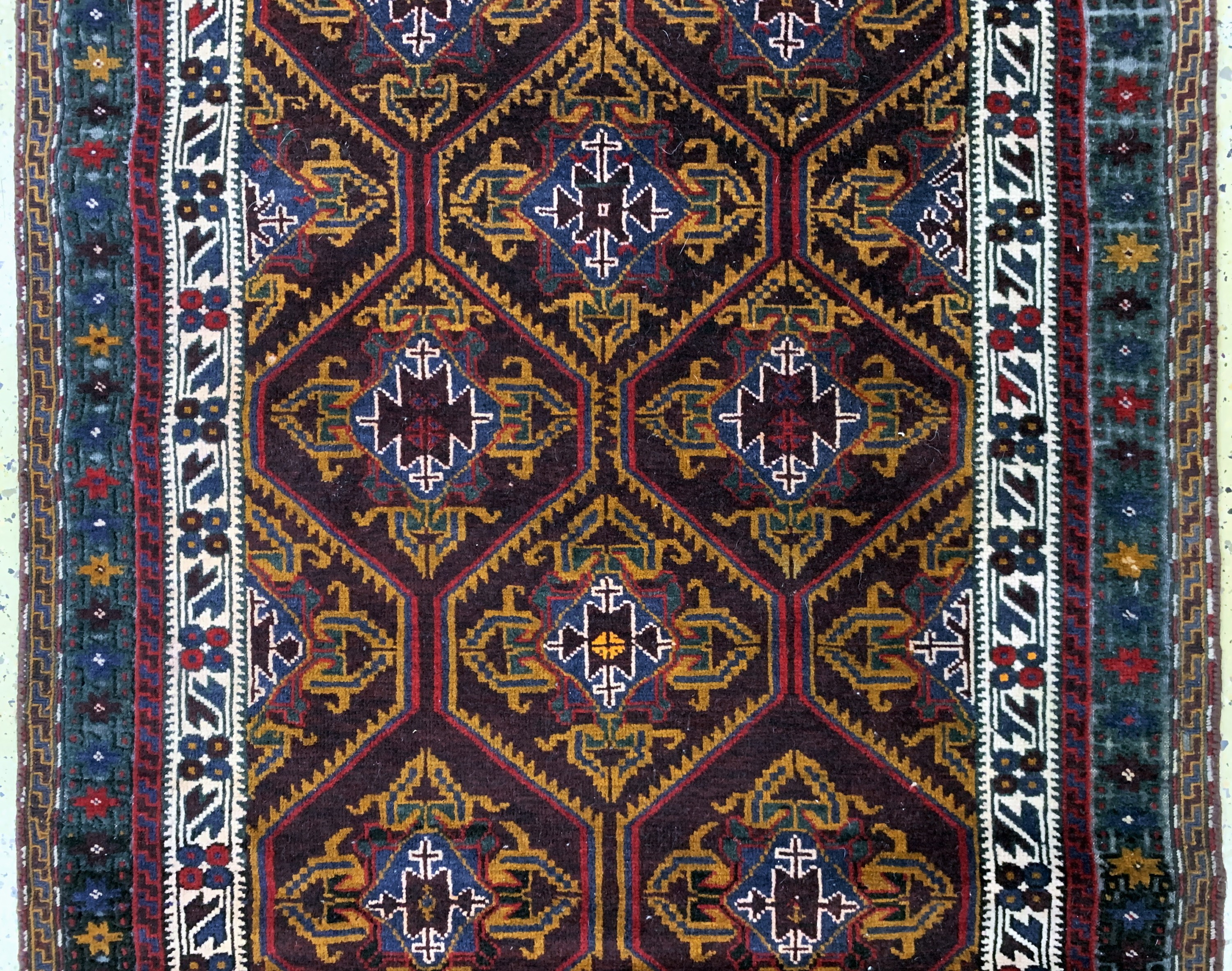 Detail b: Belutsch, Persien, Mitte 20.Jhd., Wolle aufWolle, ca. 290 x 103 cm, EHZ: 2