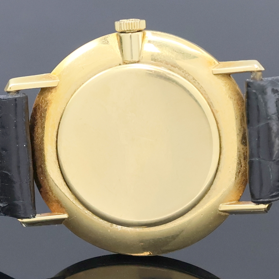 Detail e: MOVADO Armbanduhr in GG 750/000, Handaufzug, Schweiz um 1968, Boden und Glasrand aufgedr.,flache Gesamtausführ., silb. Zifferbl. m. röm. Std., ...