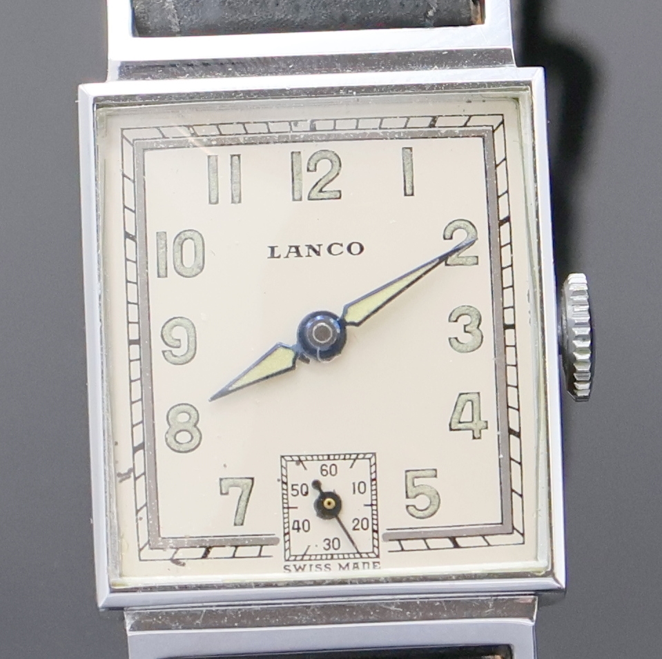 Detail a: Konvolut: 2 Armbanduhren, beide Handaufzug um 1940, verchr. Gehäuse, Edelstahlböden aufgedr., 1 x LANCO, silb. Zifferbl. m. arab. Std. fl., gebl. ...