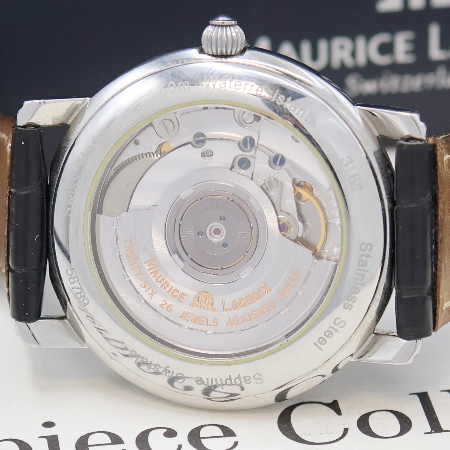 Detail e: MAURICE LACROIX Masterpiece Herrenarmbanduhr in Stahl, Schweiz lt. orig. Papier verk. 2000, Automatik, beids. vergl. Geh., Boden aufgedr., schwarz. ...