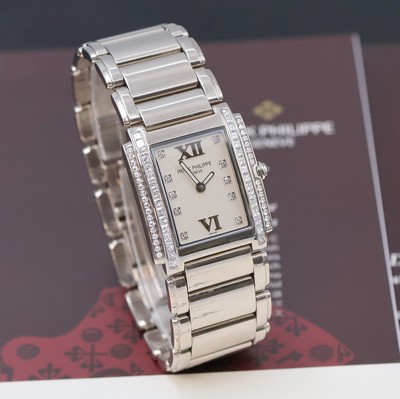 27030281b - PATEK PHILIPPE Damenarmbanduhr Serie Twenty-4 in WG 750/000 Referenz 4910/20G-011, ...