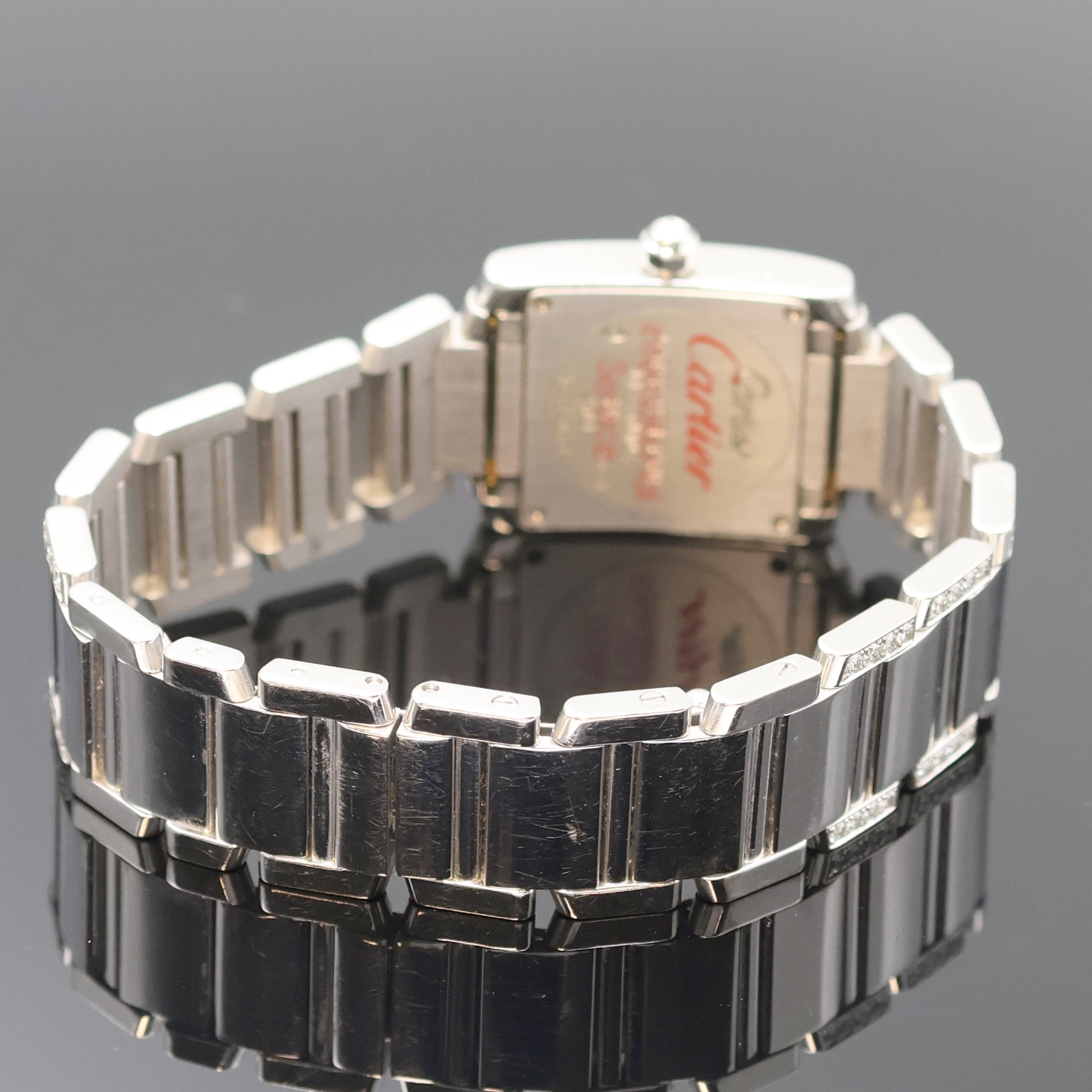 Detail b: CARTIER Damenarmbanduhr Tank Francaise in WG 750/000 mit Brillantbesatz Referenz 2403, Schweiz um 2005, quarz, Gliederband m. dopp. Faltschl., Boden ...