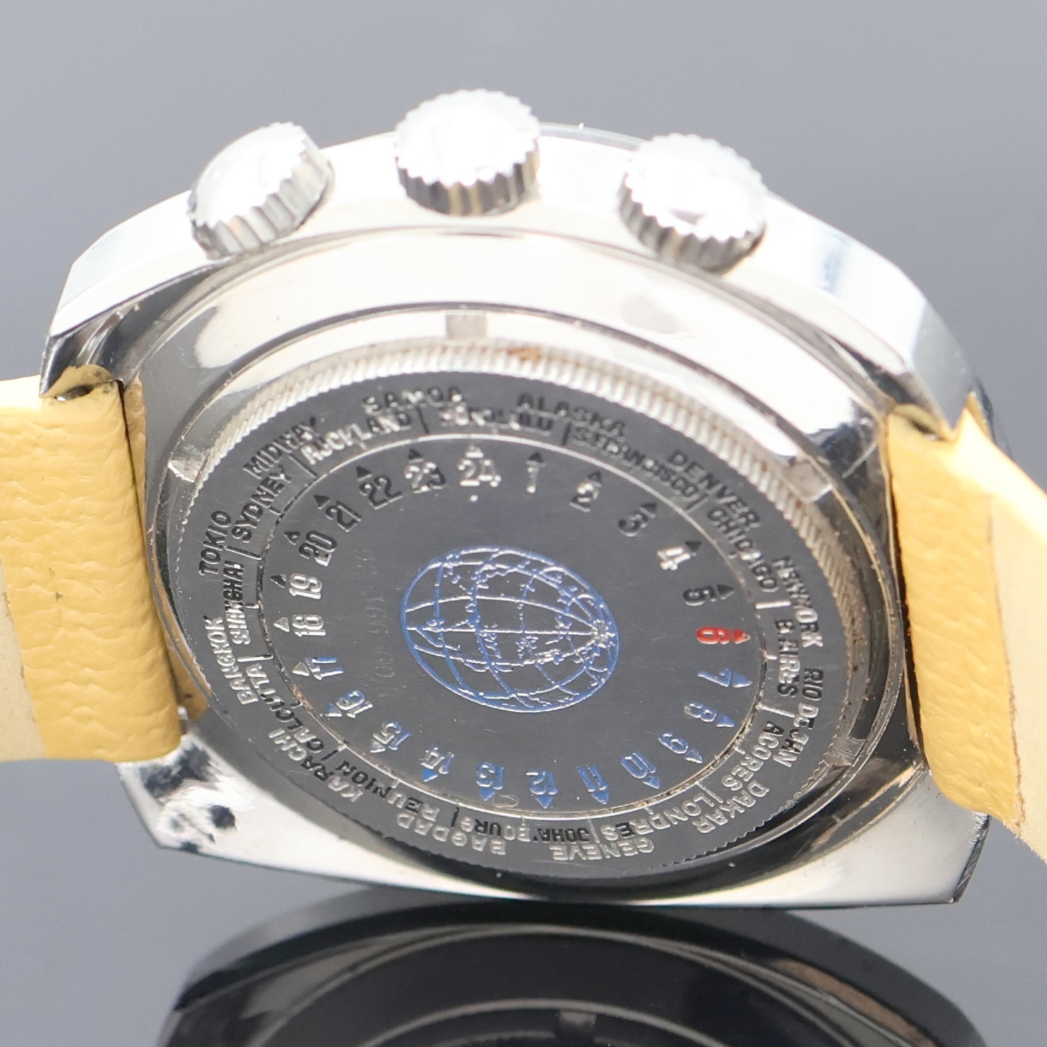 Detail d: MONDIA Memory sehr seltene Armbanduhr mit Rechenschieber und rückseitiger Weltzeit, Schweiz um 1970, Automatik, verschr. Stahlgeh., Kronen f. ...