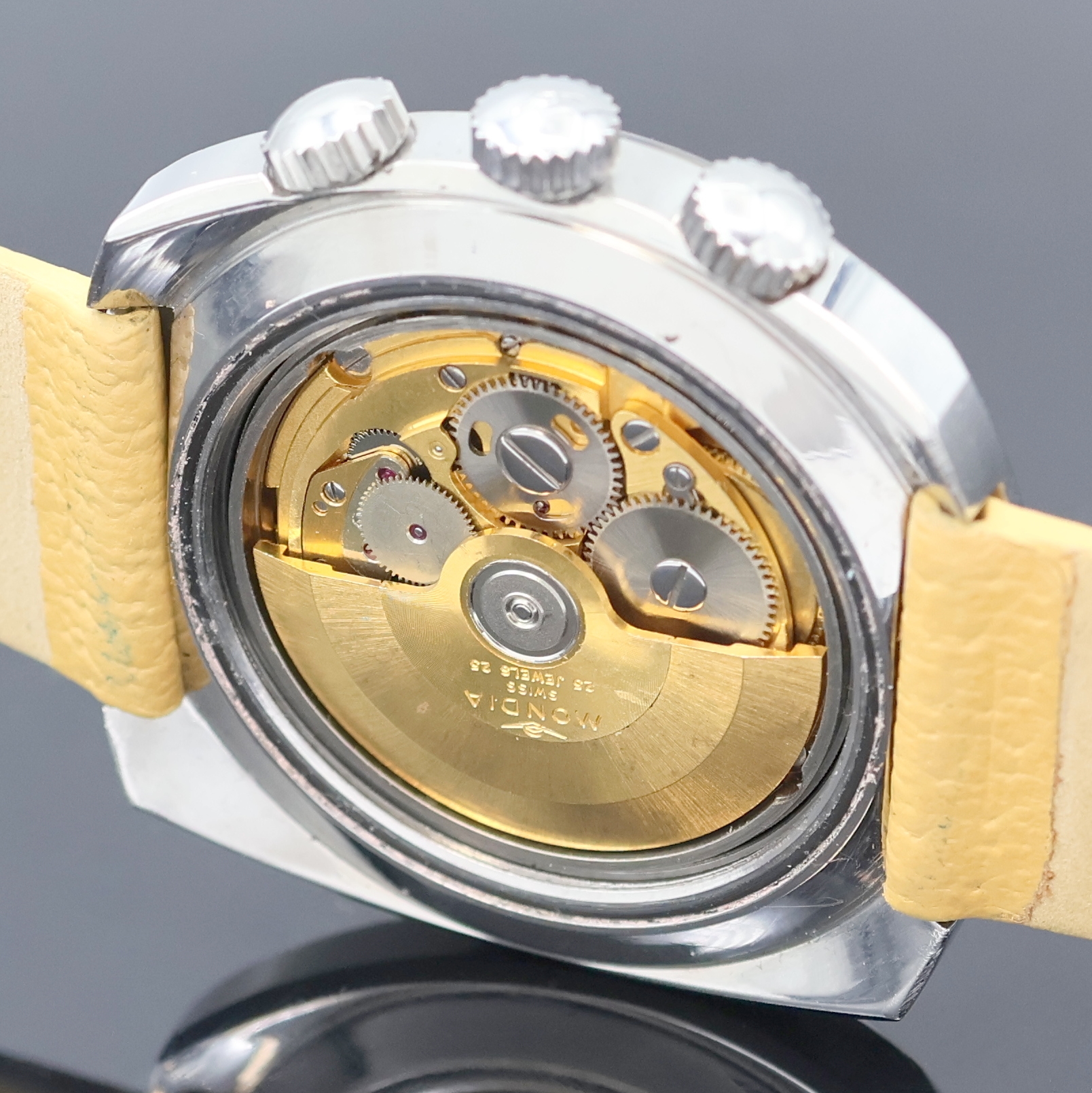 Detail e: MONDIA Memory sehr seltene Armbanduhr mit Rechenschieber und rückseitiger Weltzeit, Schweiz um 1970, Automatik, verschr. Stahlgeh., Kronen f. ...