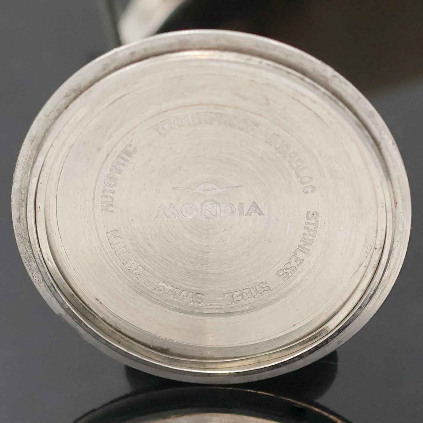 Detail g: MONDIA Memory sehr seltene Armbanduhr mit Rechenschieber und rückseitiger Weltzeit, Schweiz um 1970, Automatik, verschr. Stahlgeh., Kronen f. ...