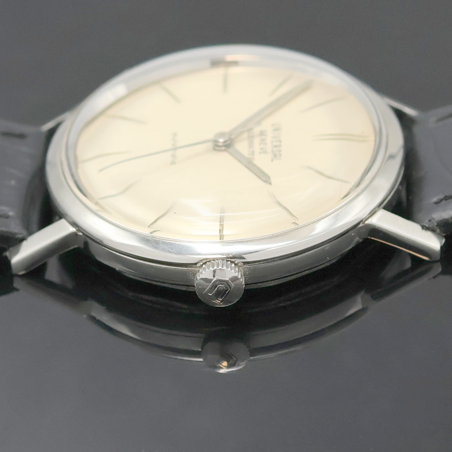Detail c: UNIVERSAL GENEVE Polerouter Armbanduhr, Schweiz um 1965, Automatik, flaches Edelstahlgeh. ohne Nummer, Boden verschr., orig. Krone, silb. Zifferbl. ...