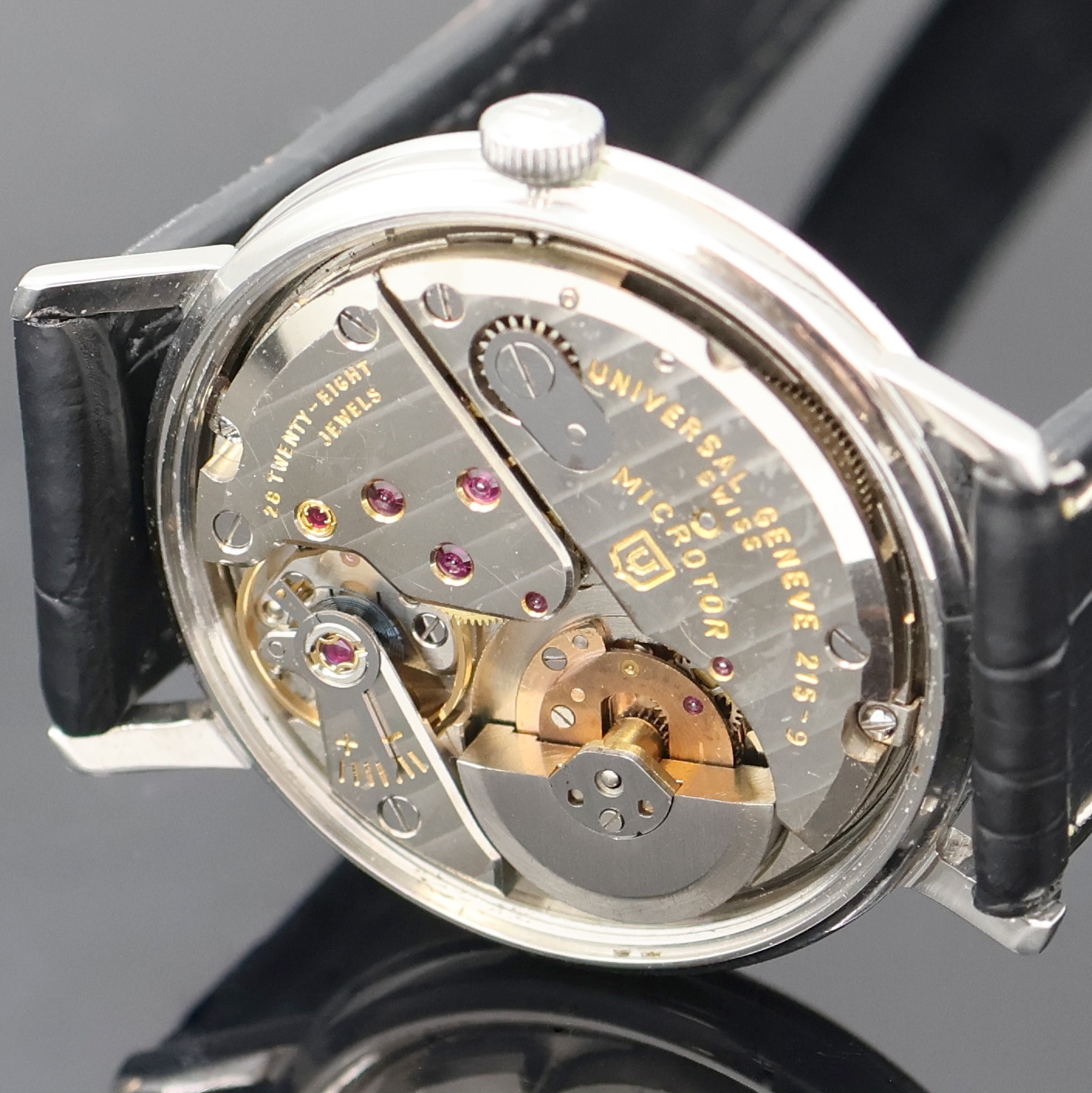 Detail e: UNIVERSAL GENEVE Polerouter Armbanduhr, Schweiz um 1965, Automatik, flaches Edelstahlgeh. ohne Nummer, Boden verschr., orig. Krone, silb. Zifferbl. ...