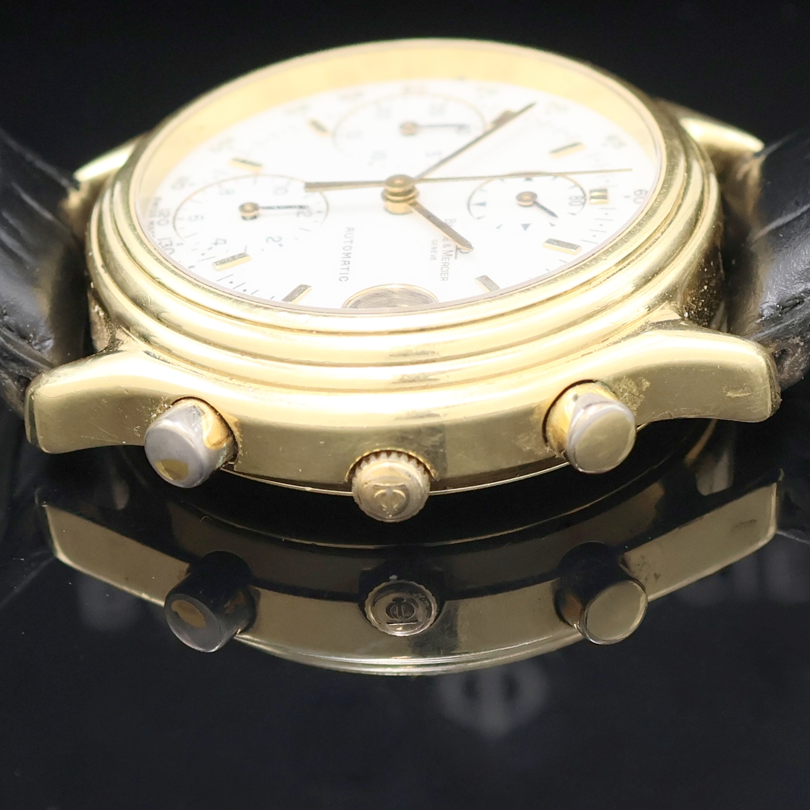 Detail c: BAUME & MERCIER Armbandchronograph in GG 750/000 Referenz 86103, Automatik, Schweiz um 1990, massives Goldgeh., Boden aufgedr., emailfarb. Zifferbl. ...