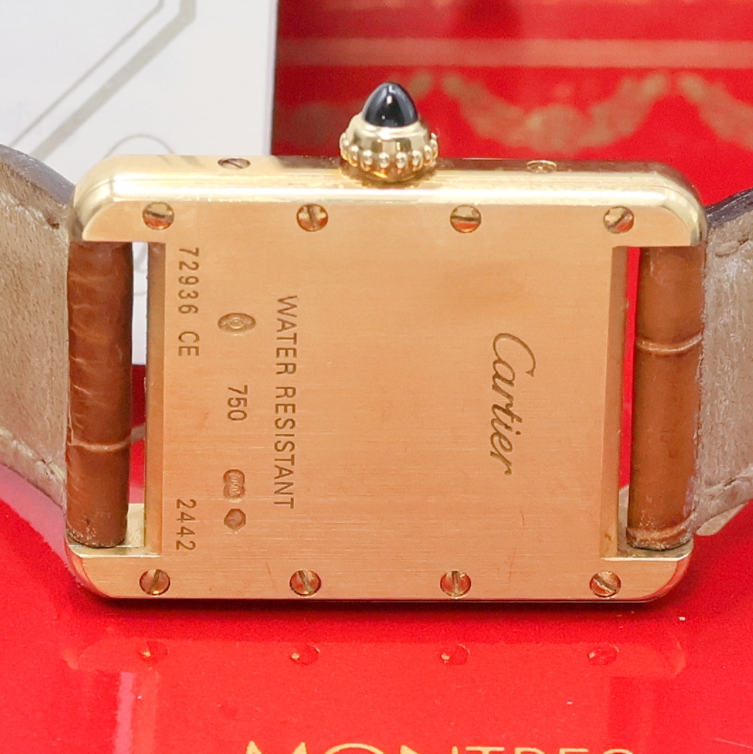Detail d: CARTIER Tank Damenarmbanduhr in GG 750/000 Referenz 2442, Schweiz um 2000, quarz, 2- teil. Geh., Boden 8-fach verschr., orig. Lederband m. orig. GG ...