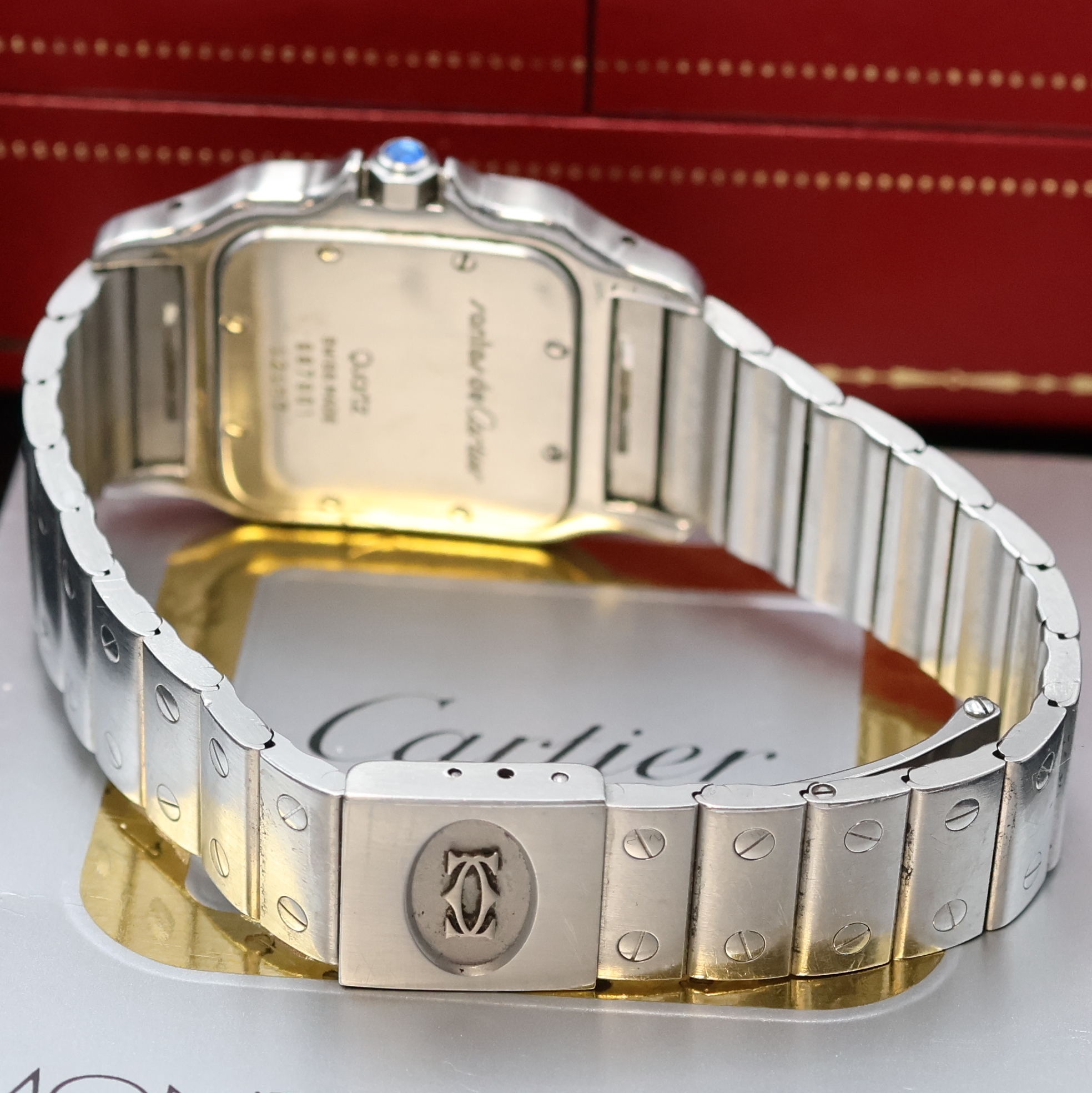 Detail b: CARTIER Santos Armbanduhr in Stahl Referenz 987901, Schweiz um 1990, quarz, Boden 8- fach verschr., orig. Gliederband (1x Schr. def./zu ers.) m. ...