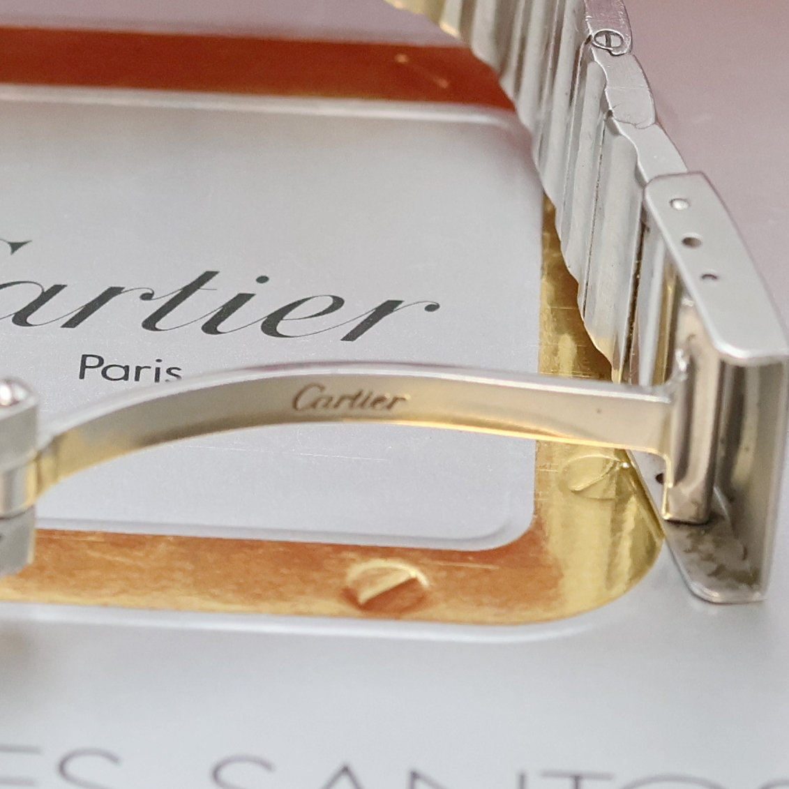 Detail c: CARTIER Santos Armbanduhr in Stahl Referenz 987901, Schweiz um 1990, quarz, Boden 8- fach verschr., orig. Gliederband (1x Schr. def./zu ers.) m. ...
