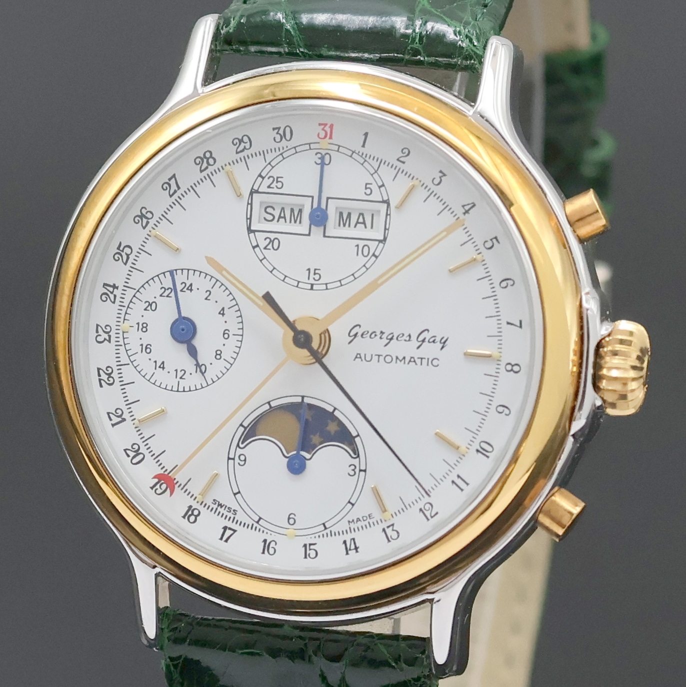 Detail a: GEORGES GAY Armbandchronograph mit Vollkalender in Stahl/Gold, Schweiz um 1995, Automatik, beids. vergl. Geh., aufgedr. Boden u. Lünette verg., ...