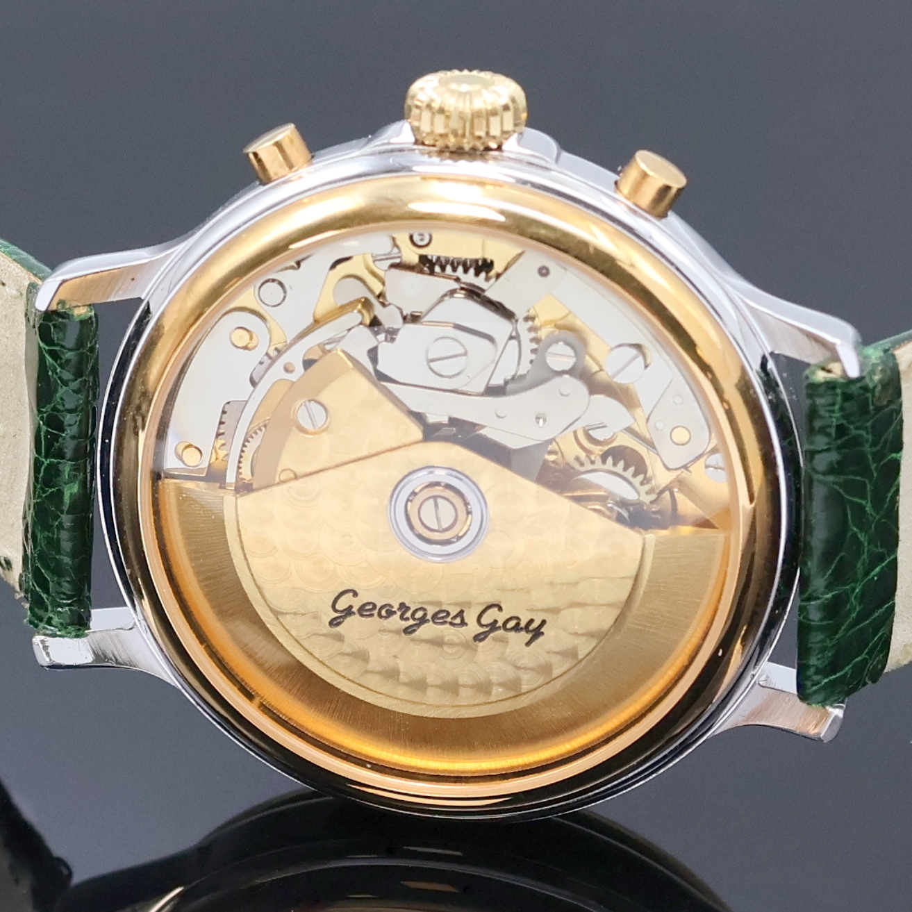Detail d: GEORGES GAY Armbandchronograph mit Vollkalender in Stahl/Gold, Schweiz um 1995, Automatik, beids. vergl. Geh., aufgedr. Boden u. Lünette verg., ...