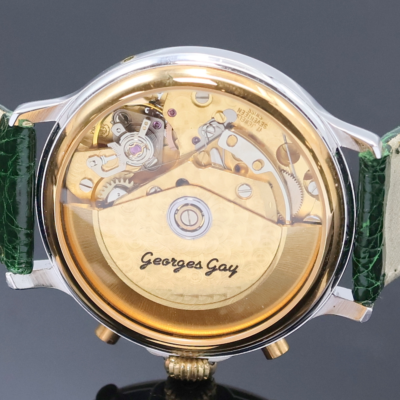 Detail e: GEORGES GAY Armbandchronograph mit Vollkalender in Stahl/Gold, Schweiz um 1995, Automatik, beids. vergl. Geh., aufgedr. Boden u. Lünette verg., ...