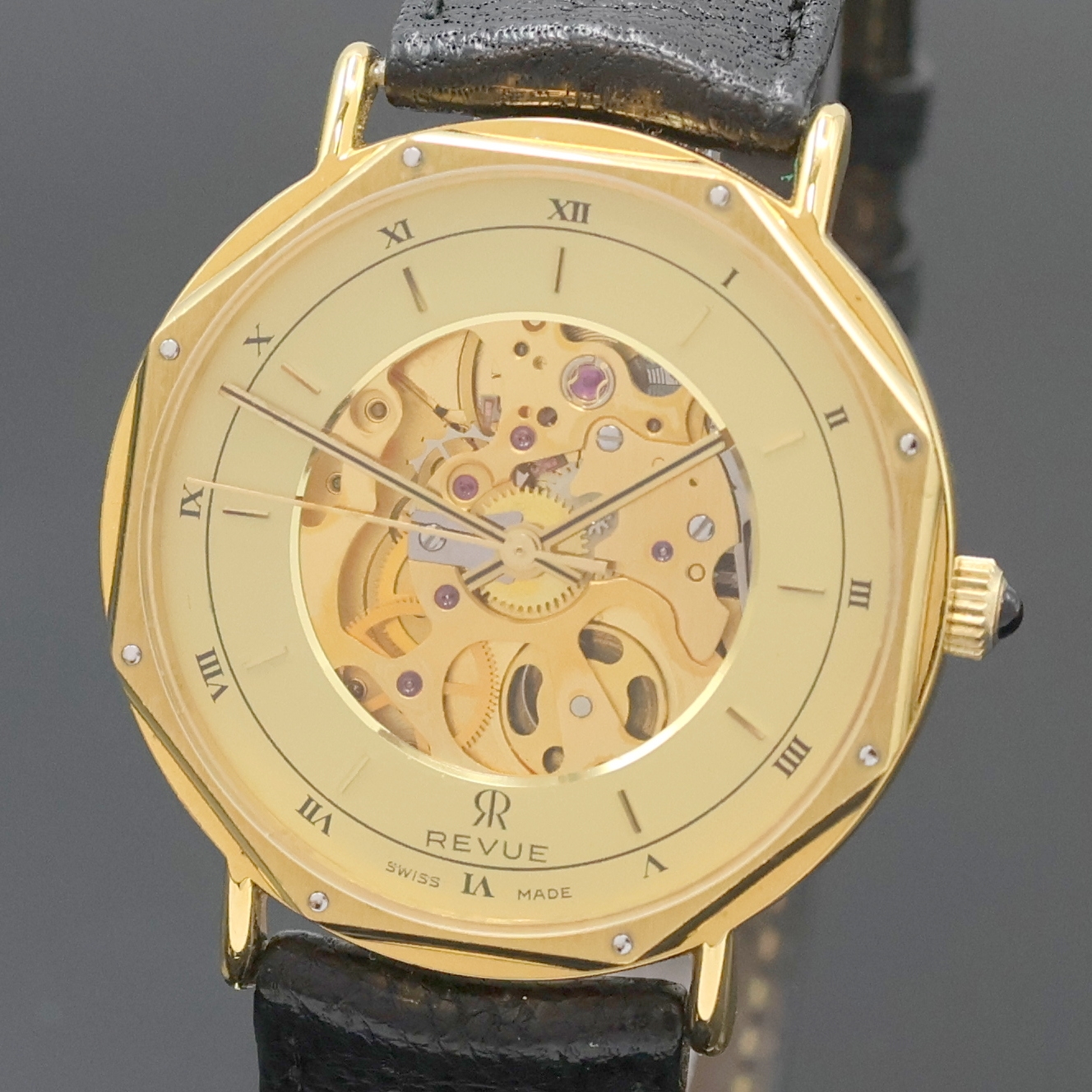 Detail a: REVUE vergoldete Armbanduhr, Schweiz um 1990, Automatik, beids. vergl. Geh., neutr. Lederband m. orig. verg. Dornschl., Schmuckkrone, champagnerfarb. ...