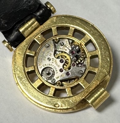 27033460d - CARTIER seltene Armbanduhr in GG 750/000, Schweiz um 1945, Handaufzug, sog. Backwinder, ...