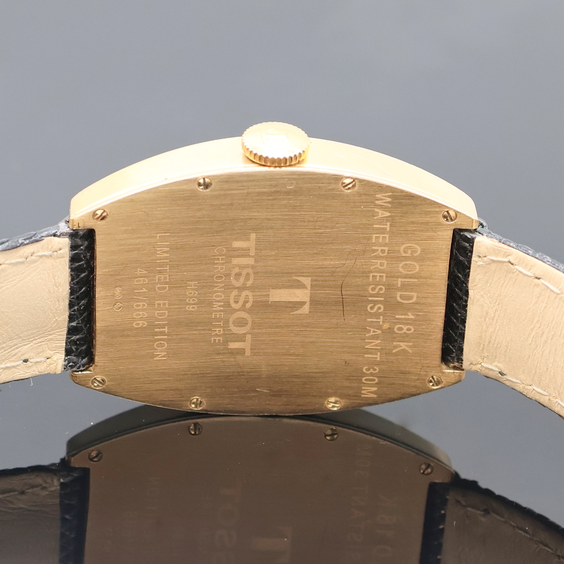 Detail c: TISSOT seltene, auf 666 Stück Chronometer Herrenarmbanduhr Porto in RG 750/000, Schweiz um 2000, Handaufzug, tonneauförmiges Geh., Lederband m. ...