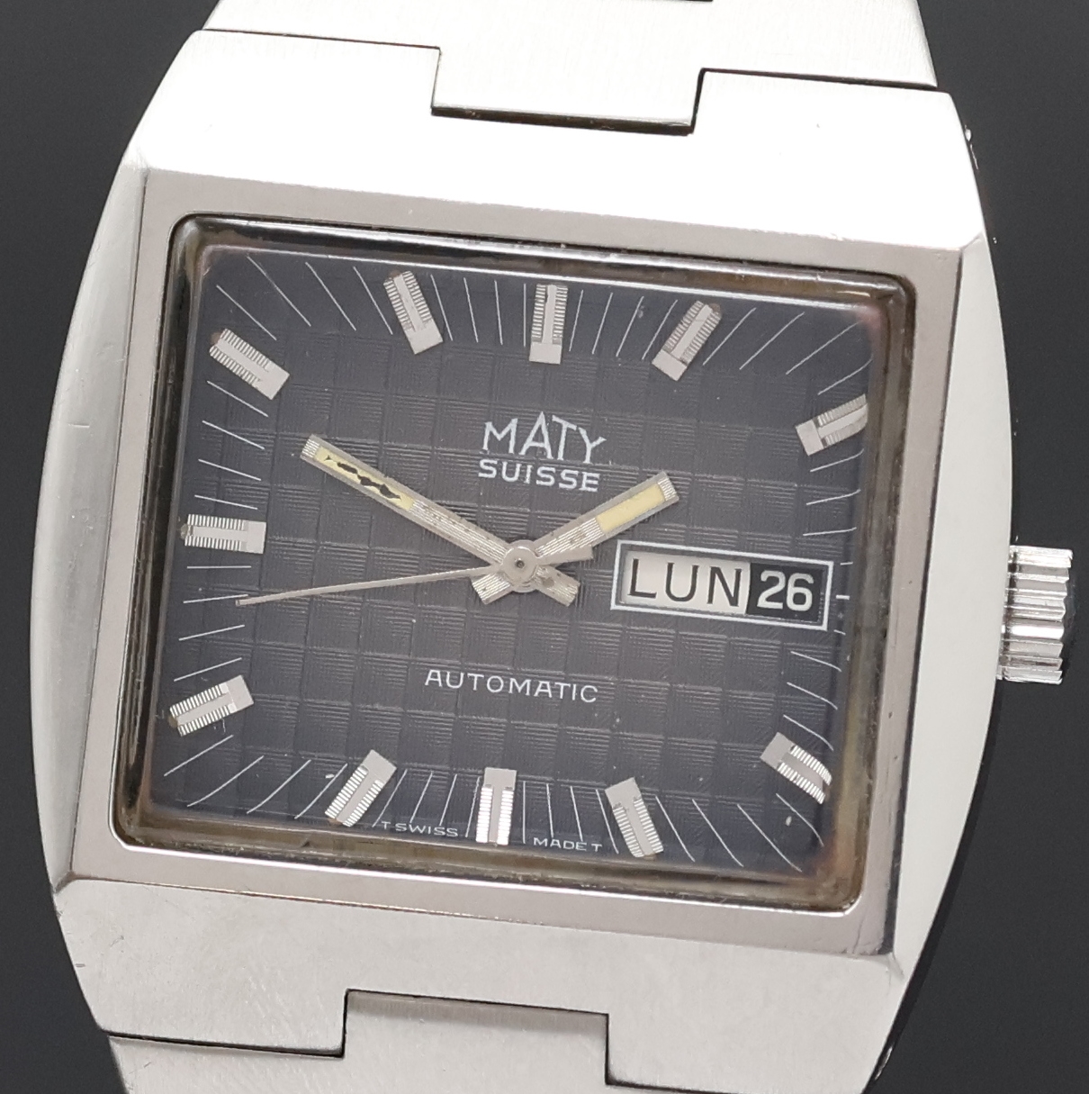 Detail a: MATY Herrenarmbanduhr, Automatik, Schweiz um 1972, massives monocoque Edelstahlgeh. inkl. orig. Gliederband m. Faltschl., graues Fume- ...