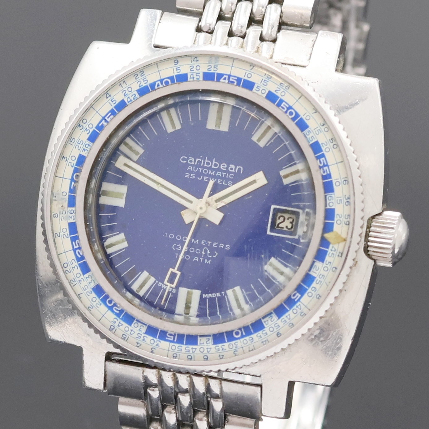 Detail a: CARIBBEAN seltene Taucheruhr, Automatik, Schweiz um 1970, kissenförmiges monocoque Edelstahlgeh. inkl. Gliederband m. Faltschl., Krone verschr., ...