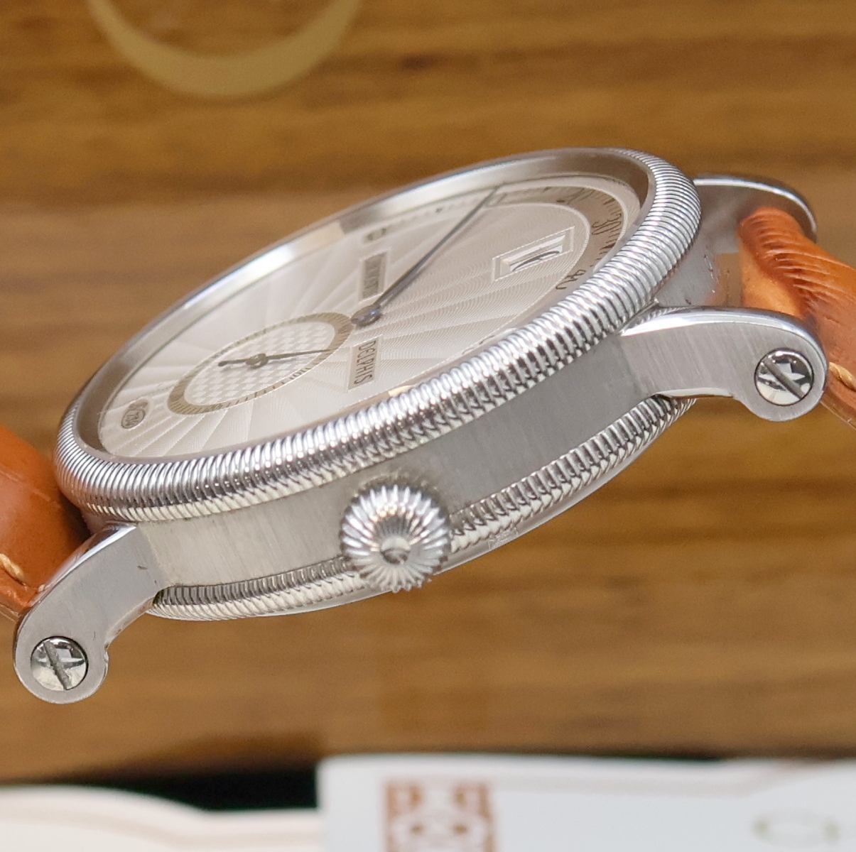 Detail e: CHRONOSWISS Delphis Herrenarmbanduhr in Edelstahl Referenz CH 1423, Schweiz um 2000, Automatik, beids. vergl. Geh., Boden geschr., neutr. Lederband ...