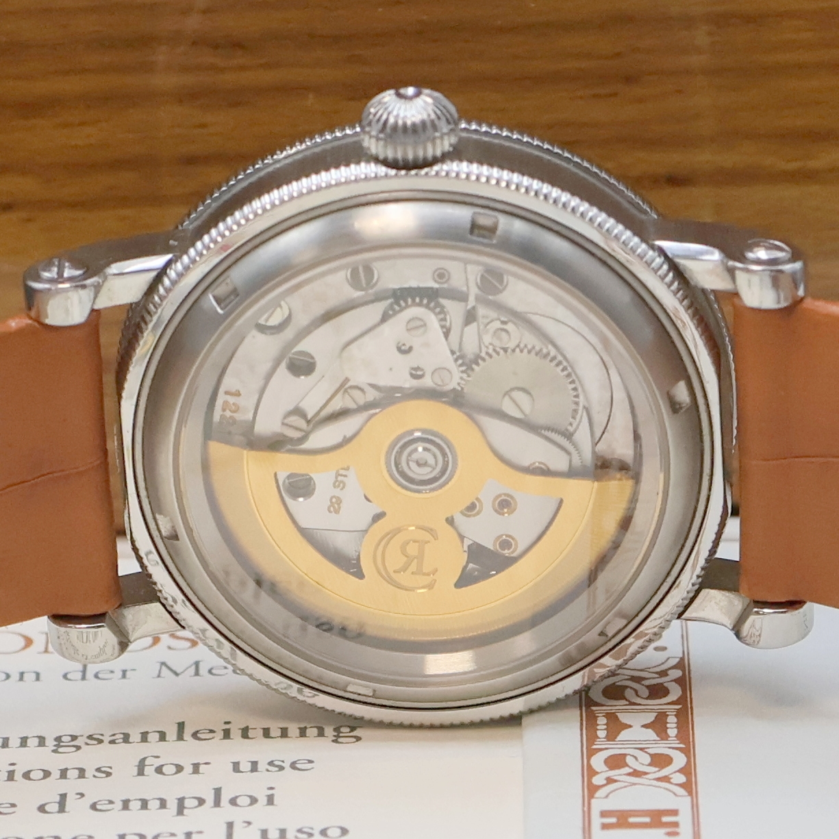 Detail f: CHRONOSWISS Delphis Herrenarmbanduhr in Edelstahl Referenz CH 1423, Schweiz um 2000, Automatik, beids. vergl. Geh., Boden geschr., neutr. Lederband ...