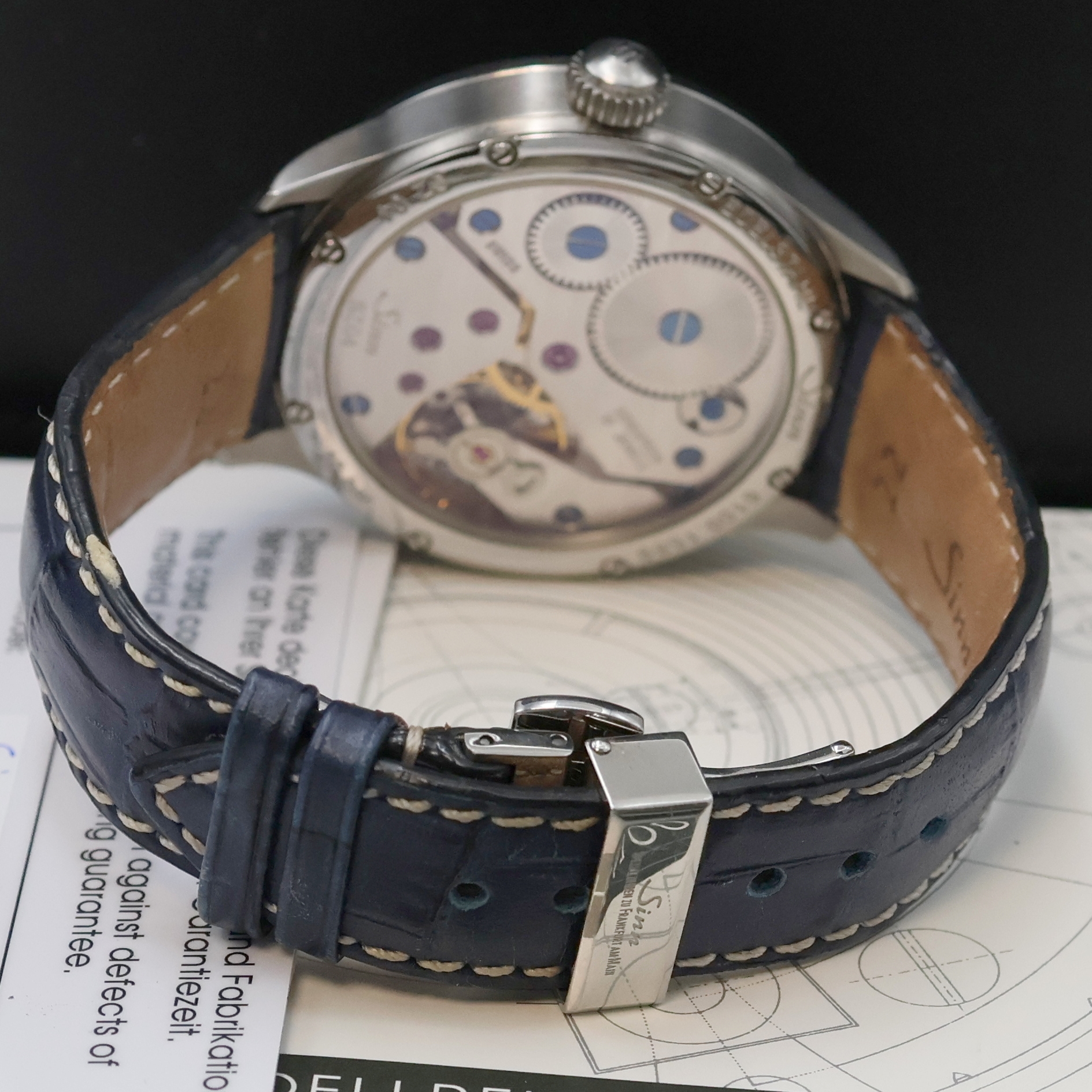 Detail b: SINN Herrenarmbanduhr Regulateur Referenz 6100, Schweiz um 2011, beids. vergl. Edelstahlgeh. inkl. orig. Lederband m. dopp. Faltschl., Saphirgl., ...